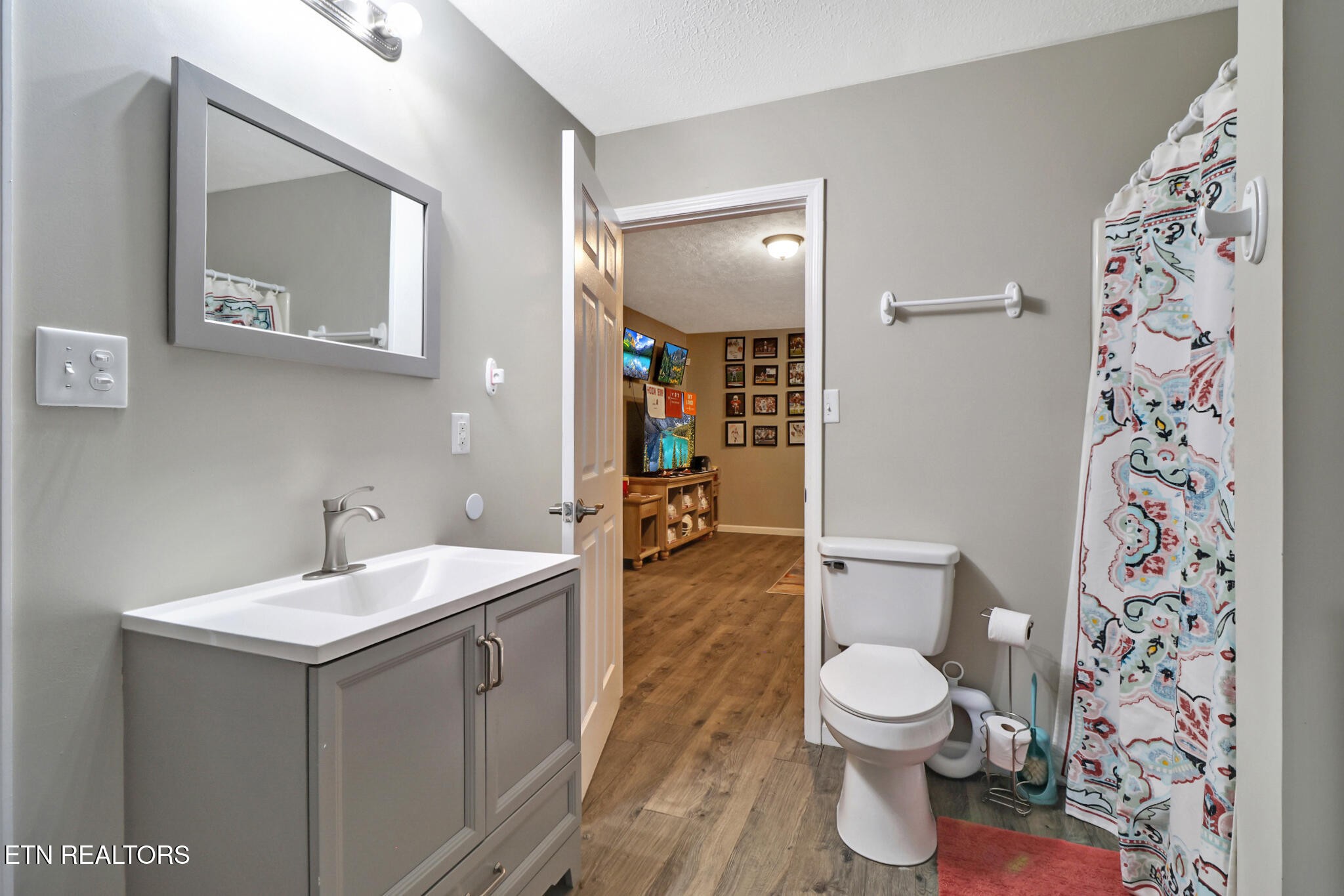 604 Bear Cub Lane Clinton, TN 37716 - Photo 21 of 23 a bathroom with a sink and a toilet