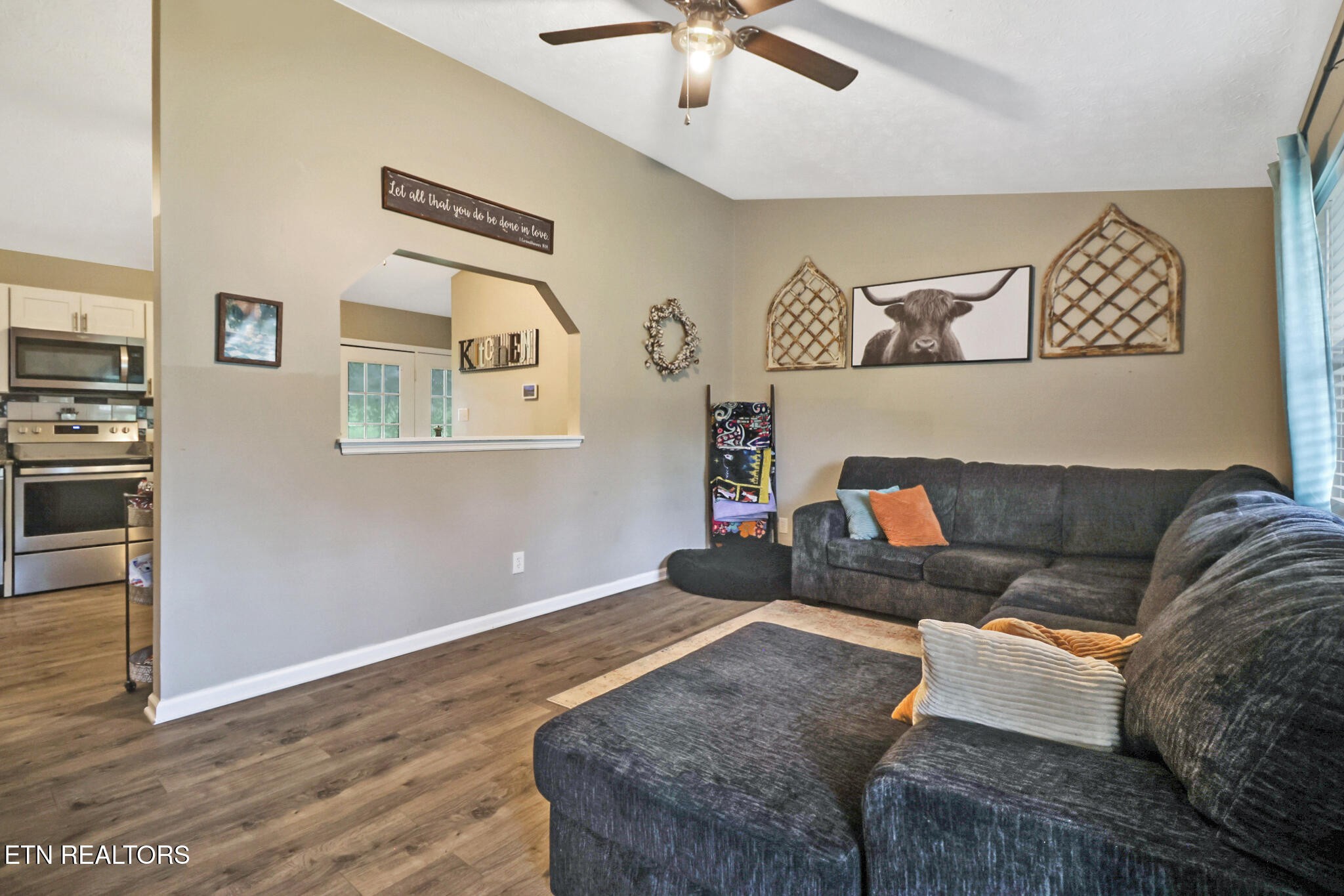 604 Bear Cub Lane Clinton, TN 37716 - Photo 3 of 23 a living room with furniture and a wooden floor