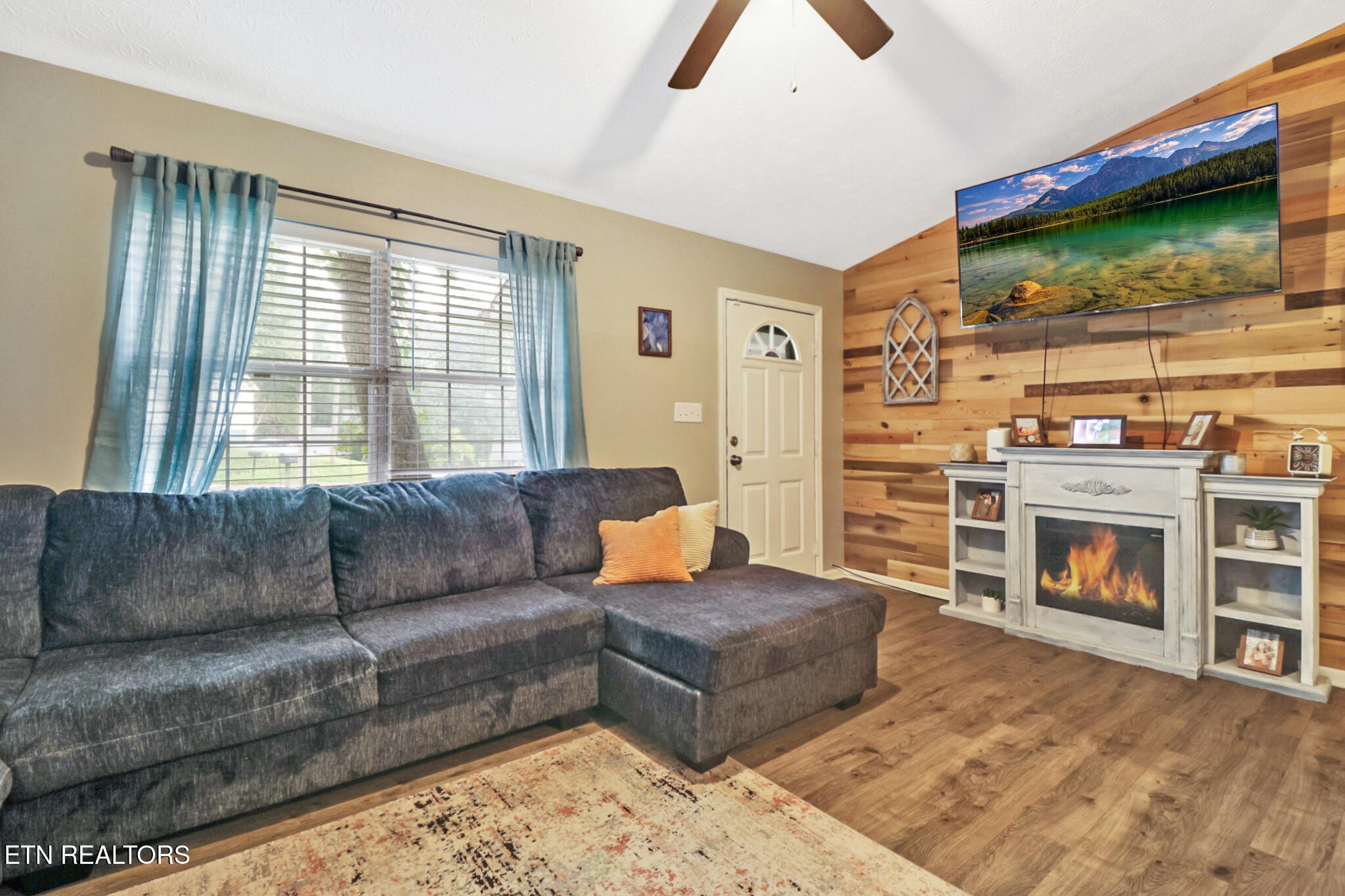 604 Bear Cub Lane Clinton, TN 37716 - Photo 4 of 23 a living room with furniture and a fireplace