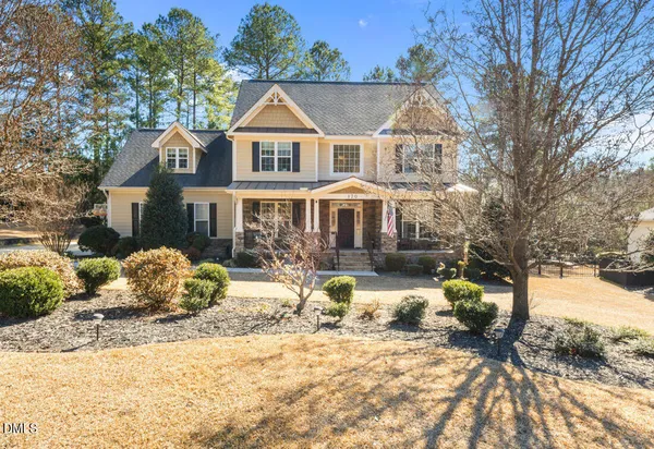 a front view of a house with a patio
