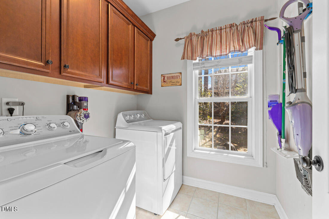 170 Valley Pines Circle Spring Lake, NC 28390 - Photo 10 of 55 a utility room with dryer and washer