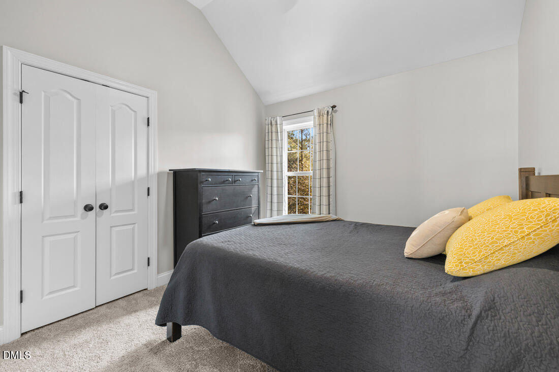 170 Valley Pines Circle Spring Lake, NC 28390 - Photo 31 of 55 a bedroom with a bed and a window