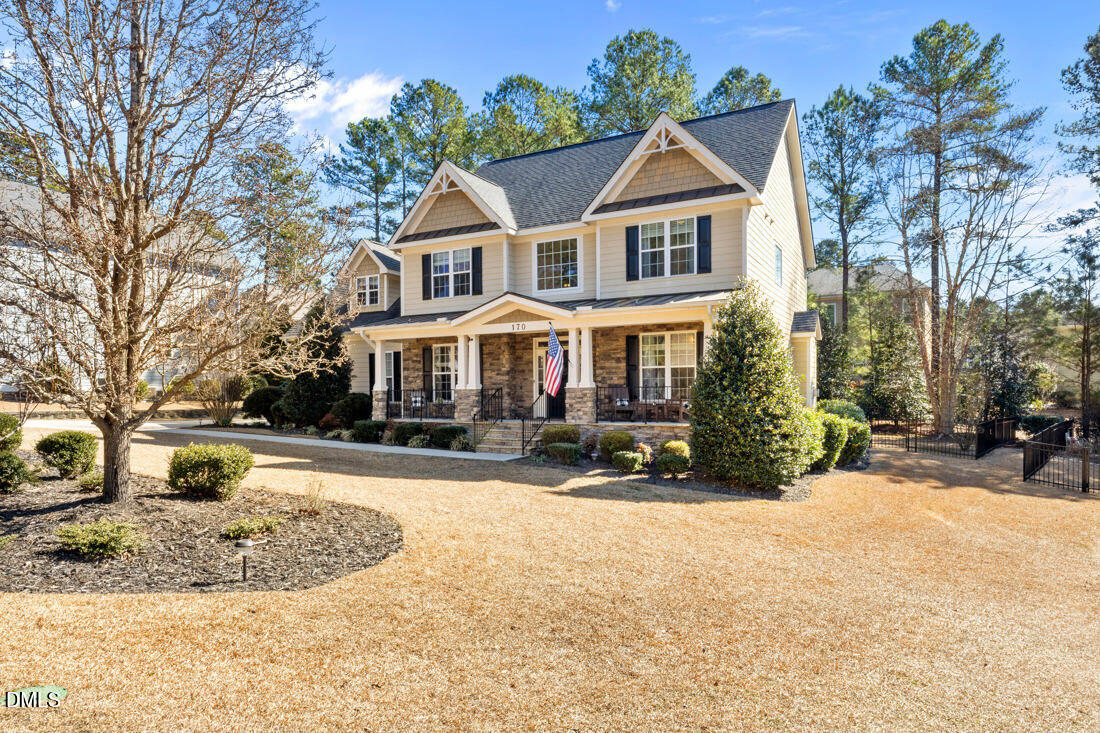 170 Valley Pines Circle Spring Lake, NC 28390 - Photo 41 of 55 a front view of a house with a yard covered with snow