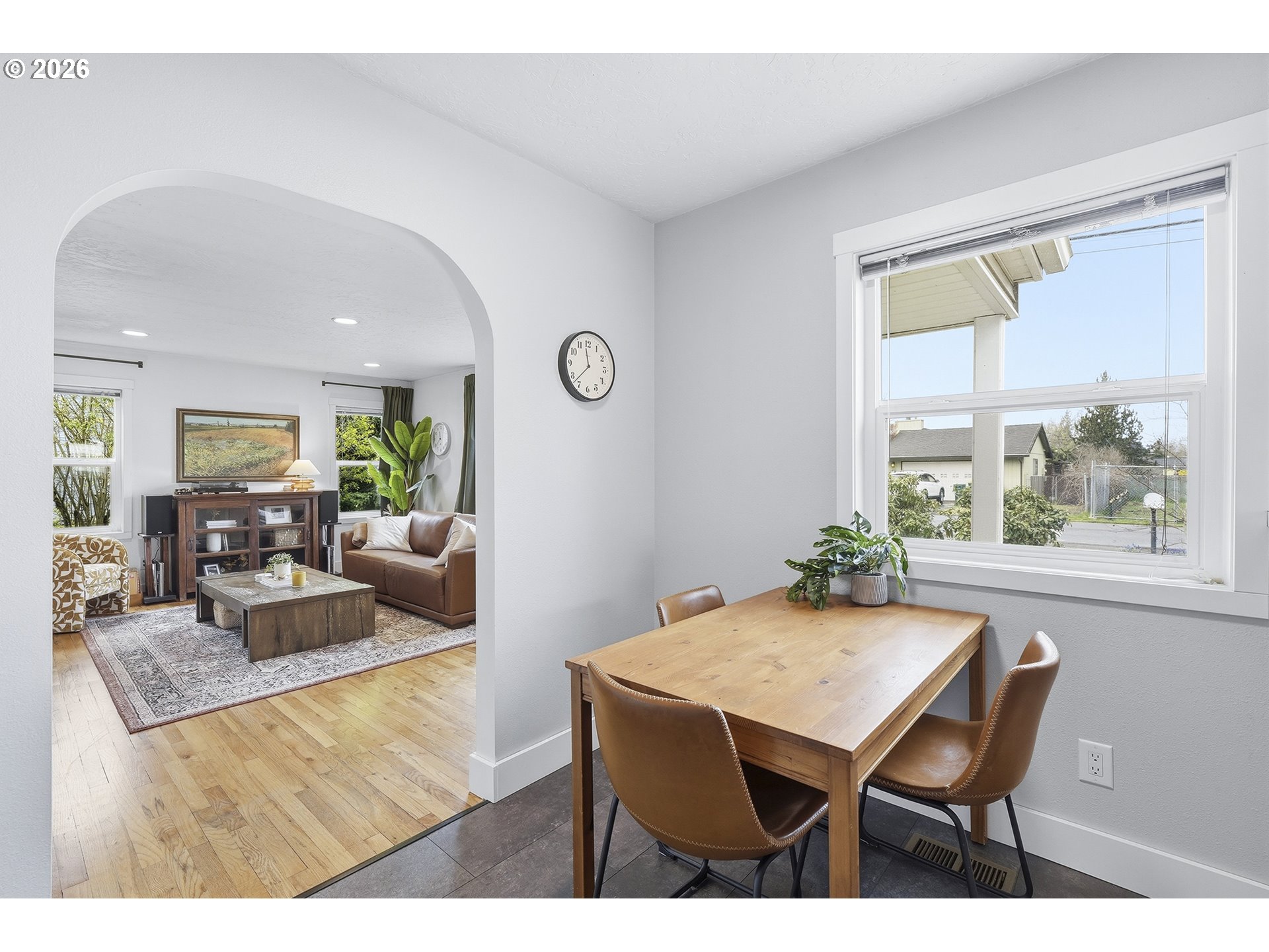 11250 Southwest 78th Avenue Tigard, OR 97223 - Photo 11 of 30 a view of a dining room with furniture and wooden floor