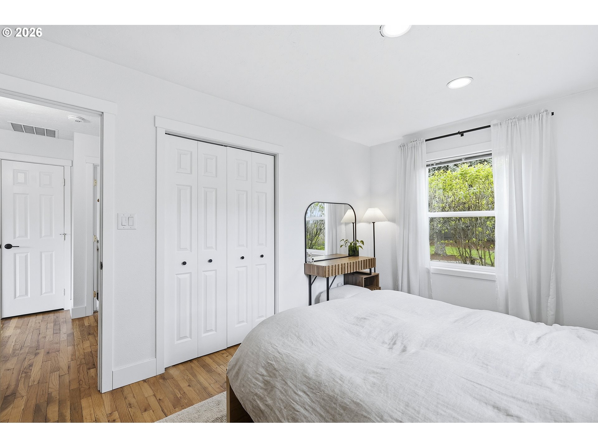 11250 Southwest 78th Avenue Tigard, OR 97223 - Photo 17 of 30 a bedroom with a bed and a window