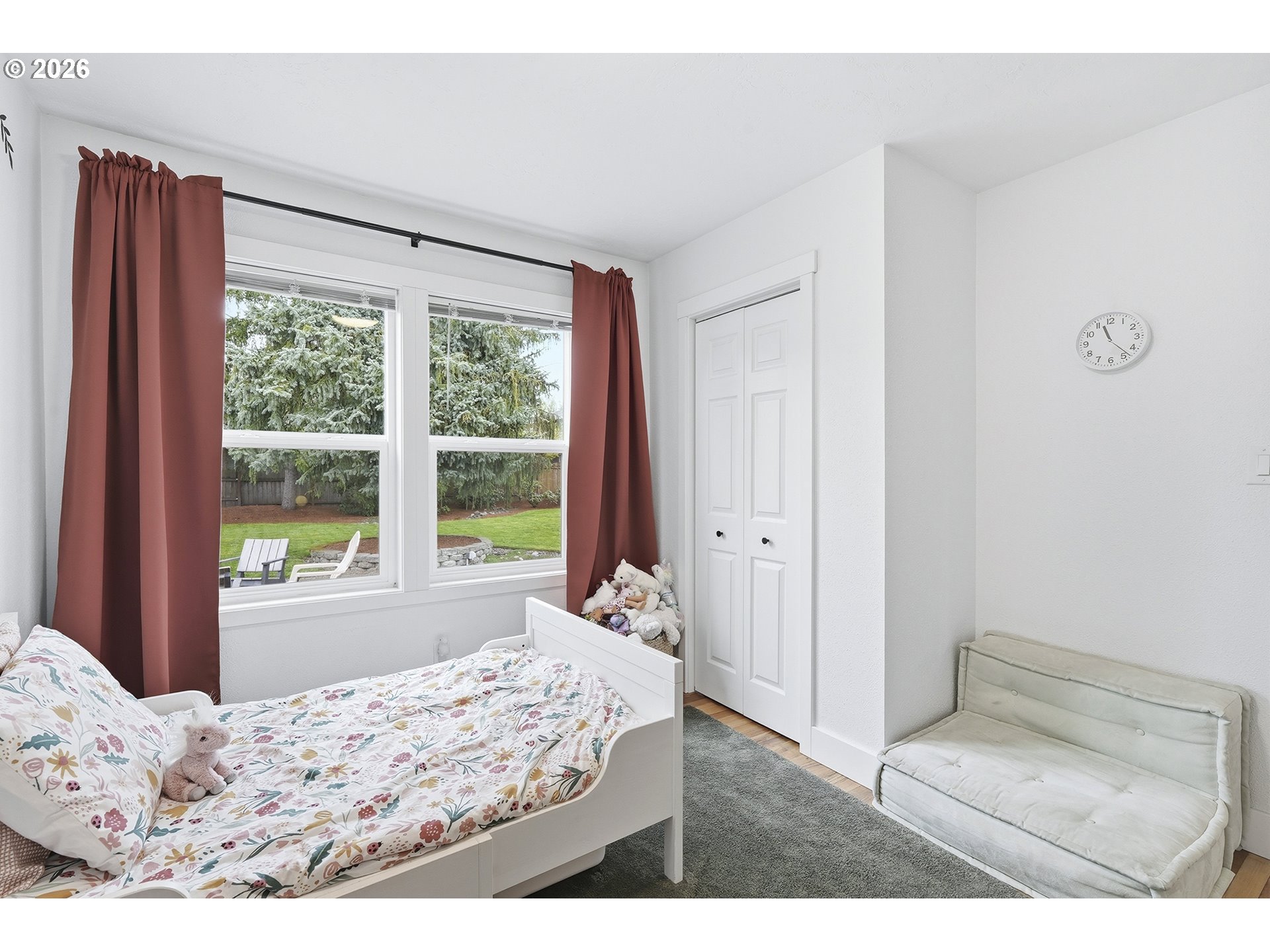 11250 Southwest 78th Avenue Tigard, OR 97223 - Photo 20 of 30 a bedroom with a bed and a large window