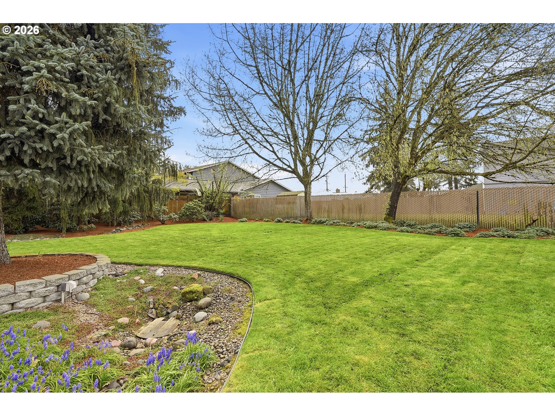 11250 Southwest 78th Avenue Tigard, OR 97223 - Photo 26 of 30 a view of a backyard with large trees