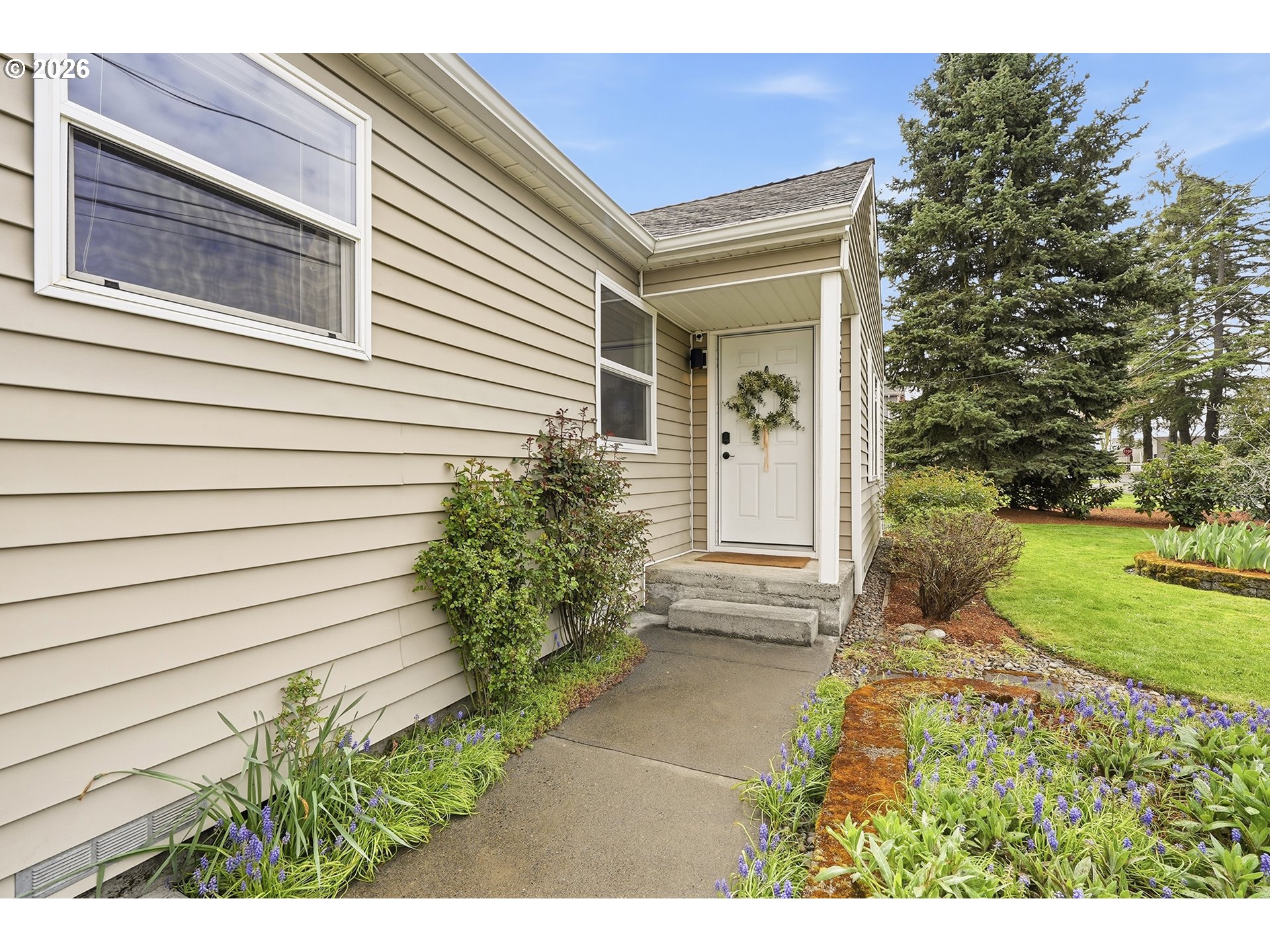 11250 Southwest 78th Avenue Tigard, OR 97223 - Photo 4 of 30 a view of a house with a yard