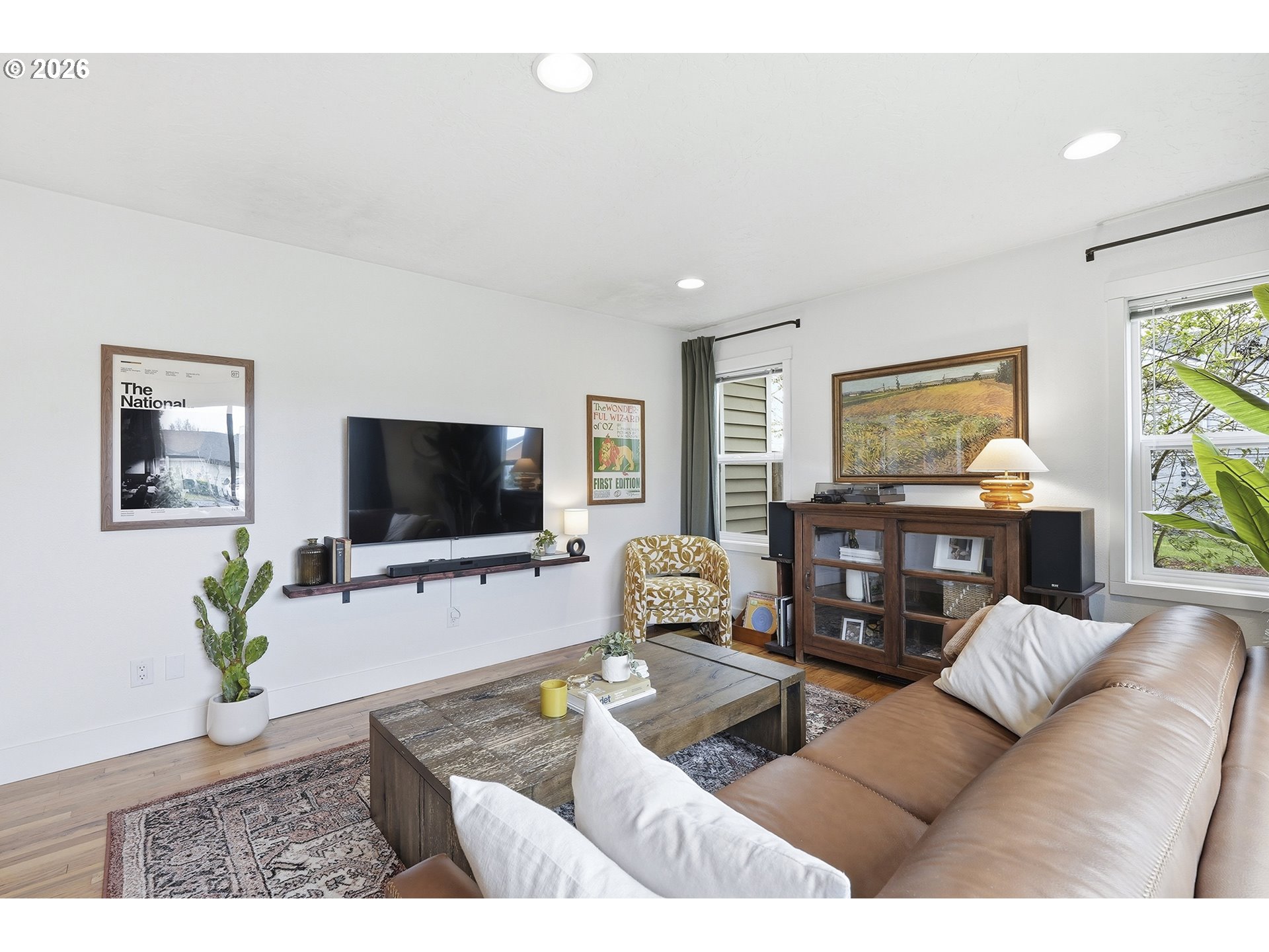 11250 Southwest 78th Avenue Tigard, OR 97223 - Photo 7 of 30 a living room with furniture and a flat screen tv