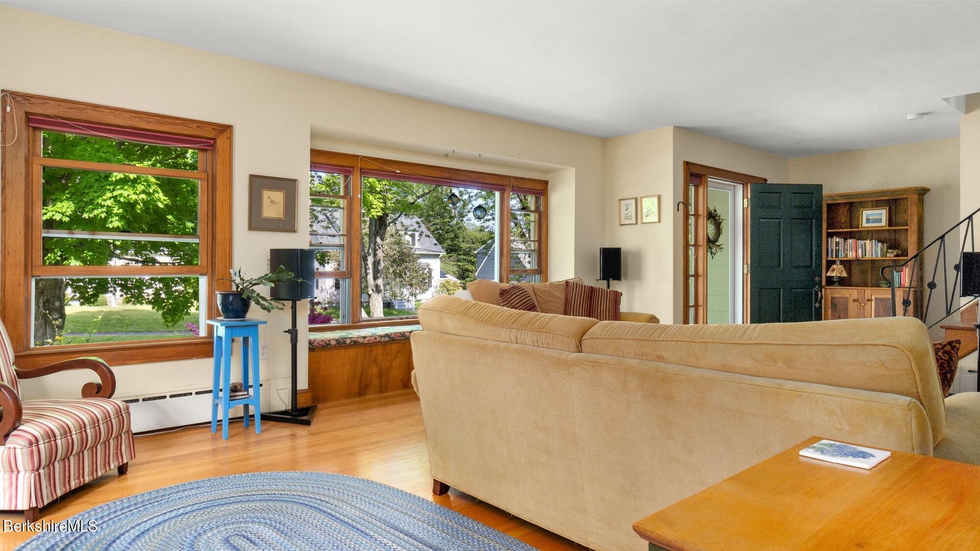 23 Ridgeway Avenue Pittsfield, MA 01201 - Photo 11 of 29 a living room with furniture and a large window