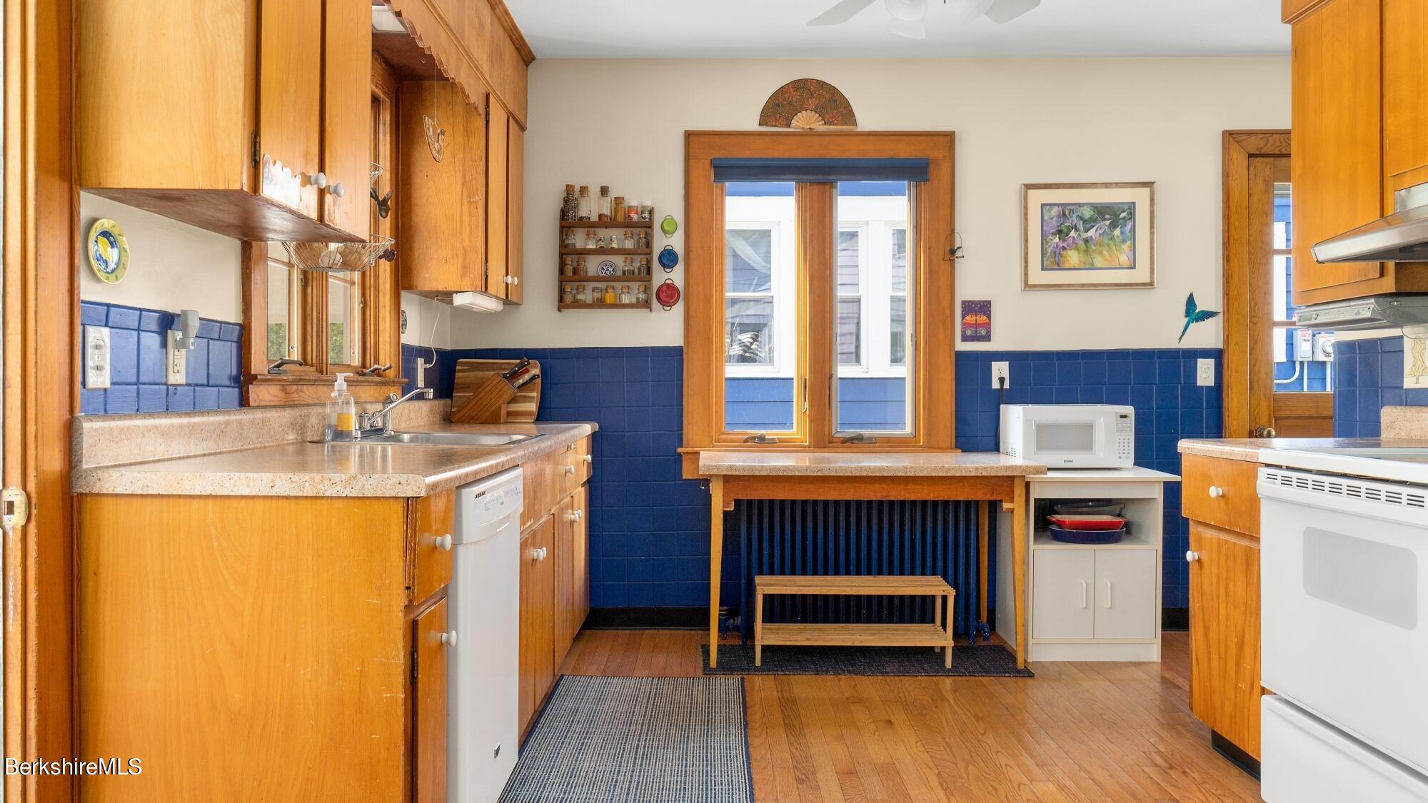23 Ridgeway Avenue Pittsfield, MA 01201 - Photo 15 of 29 a kitchen with a refrigerator and a sink