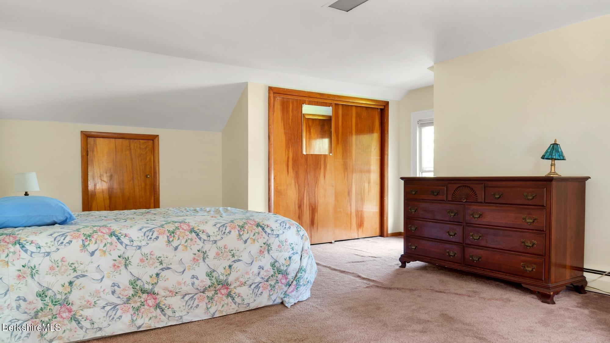 23 Ridgeway Avenue Pittsfield, MA 01201 - Photo 27 of 29 a bedroom with a bed and a dresser