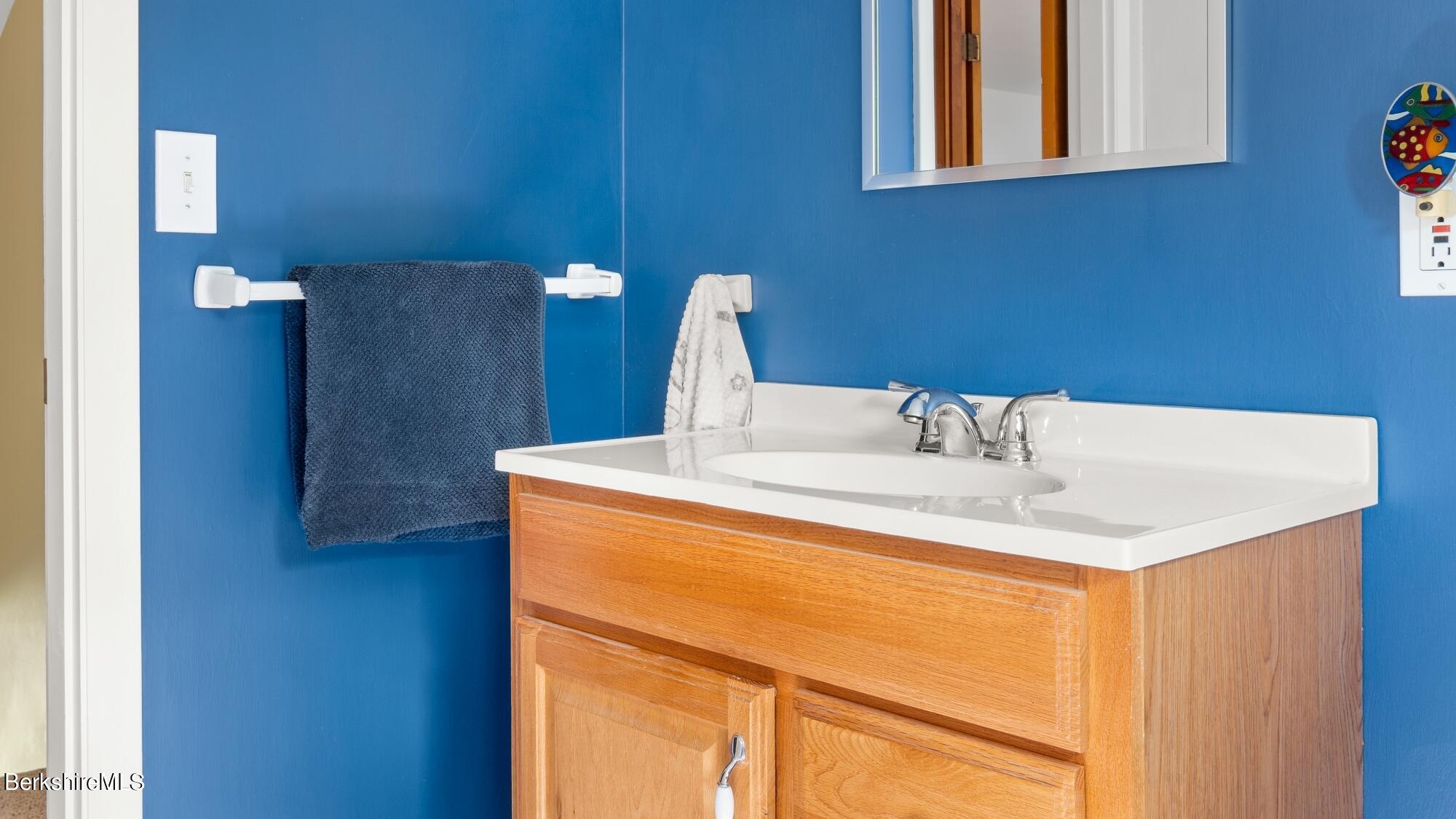 23 Ridgeway Avenue Pittsfield, MA 01201 - Photo 29 of 29 a bathroom with a sink and a mirror