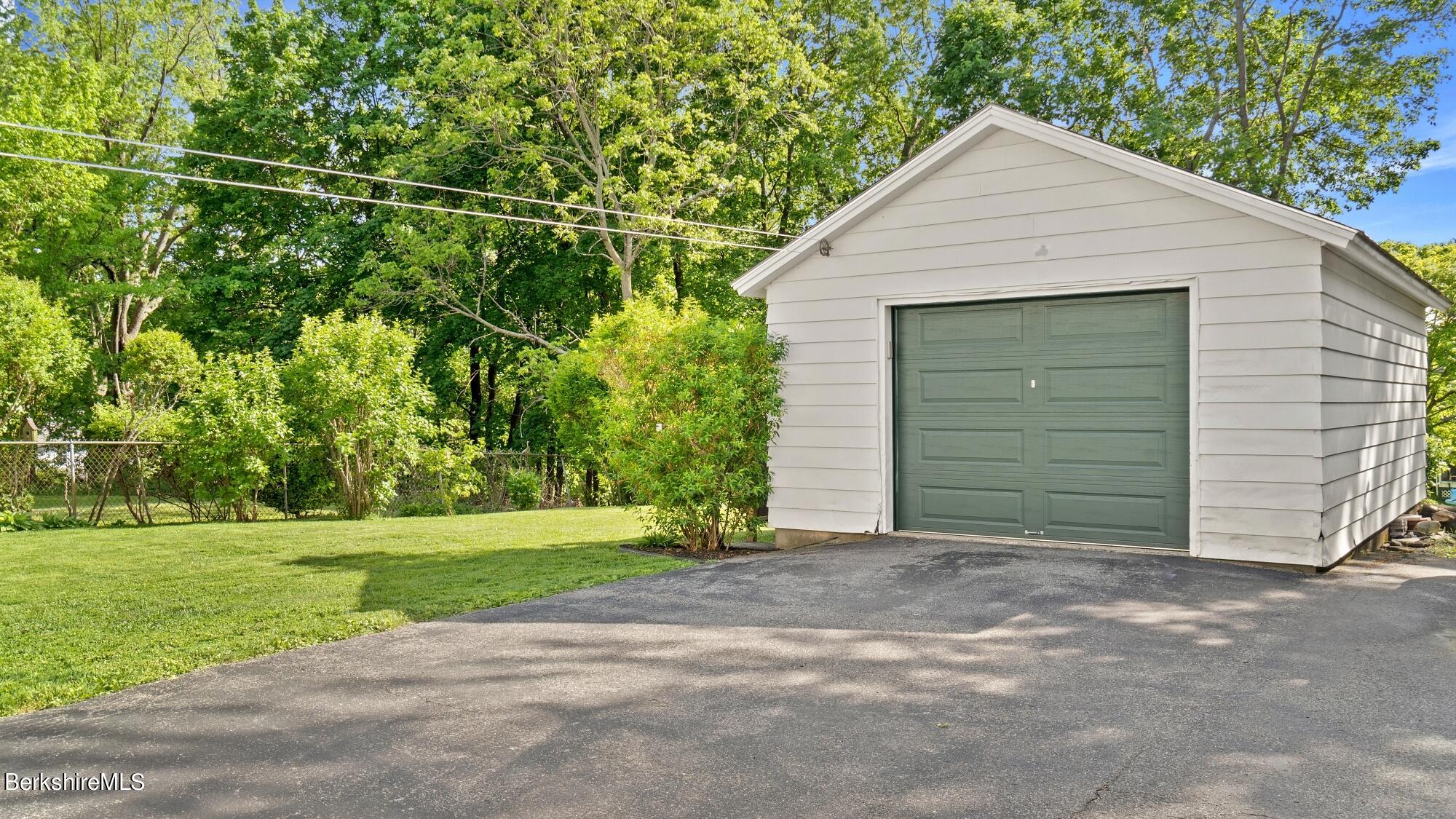 23 Ridgeway Avenue Pittsfield, MA 01201 - Photo 4 of 29 a front view of a house with a yard
