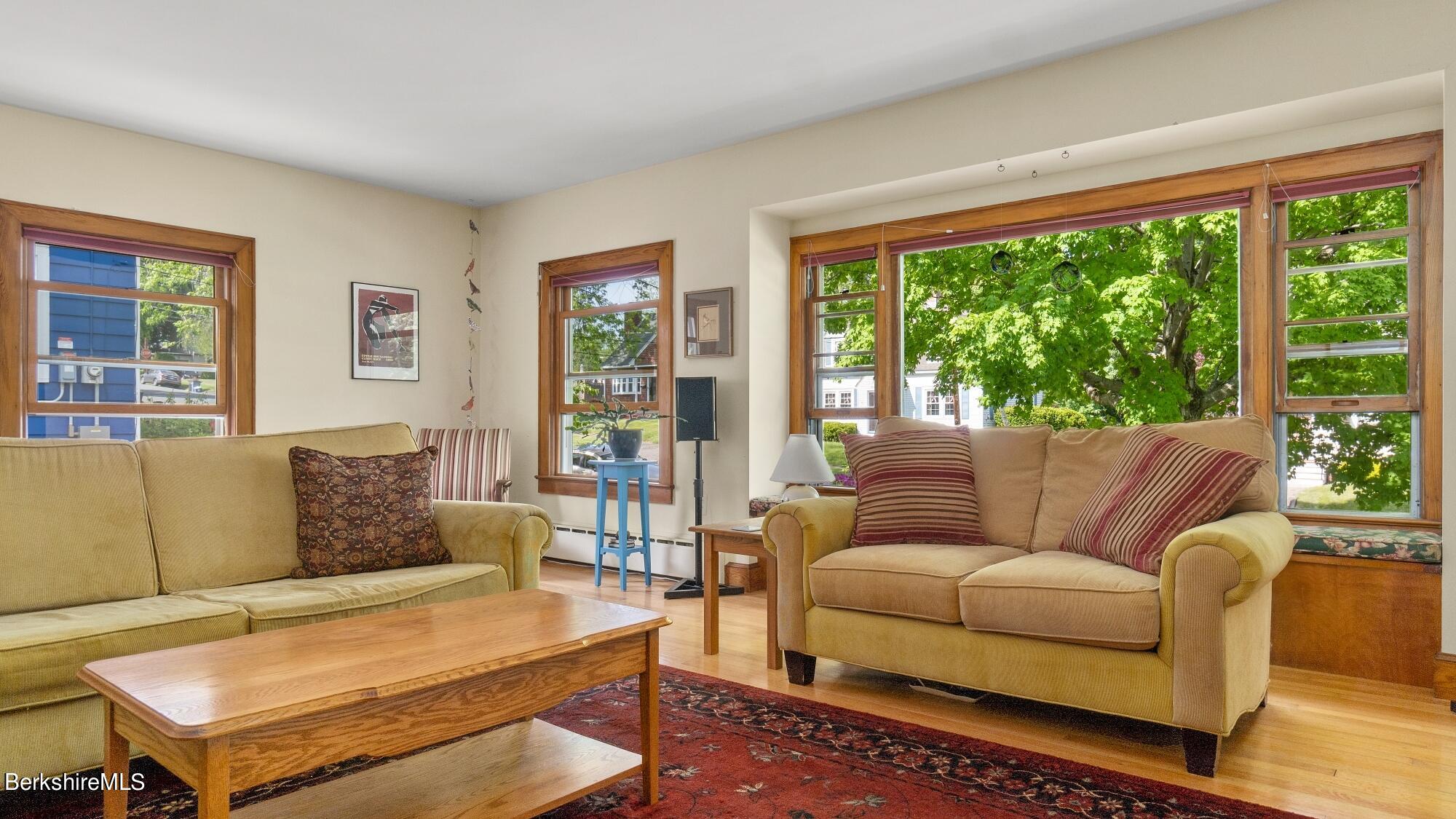 23 Ridgeway Avenue Pittsfield, MA 01201 - Photo 9 of 29 a living room with furniture and a large window