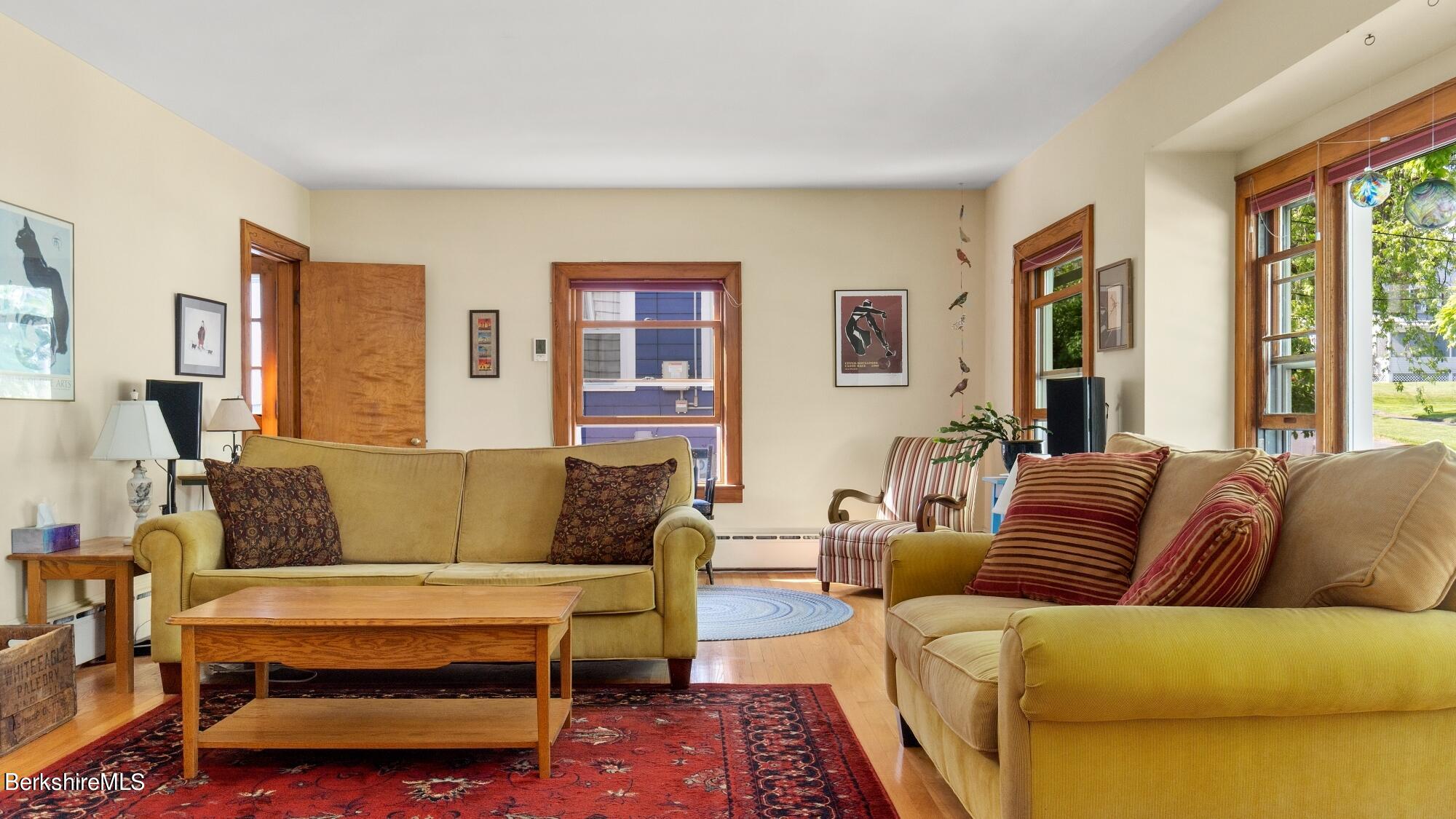 23 Ridgeway Avenue Pittsfield, MA 01201 - Photo 10 of 29 a living room with furniture and a couch