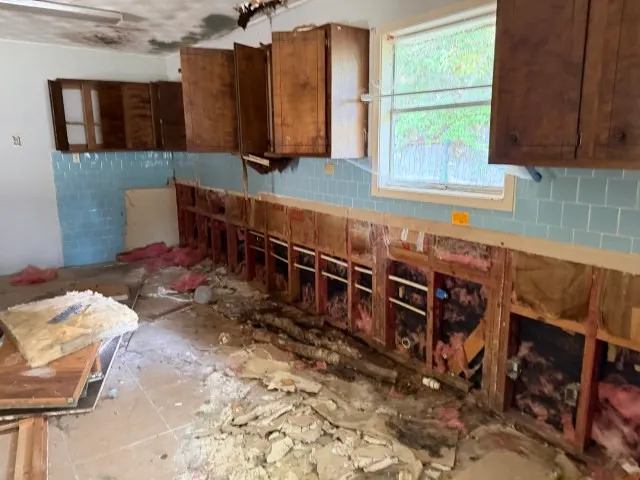 a view of kitchen with chair and window