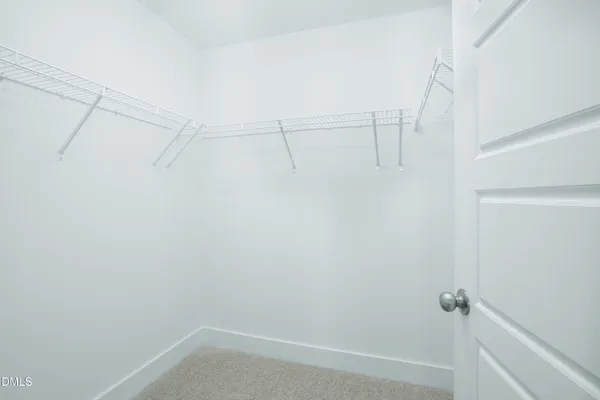 a view of small space with racks on the wall