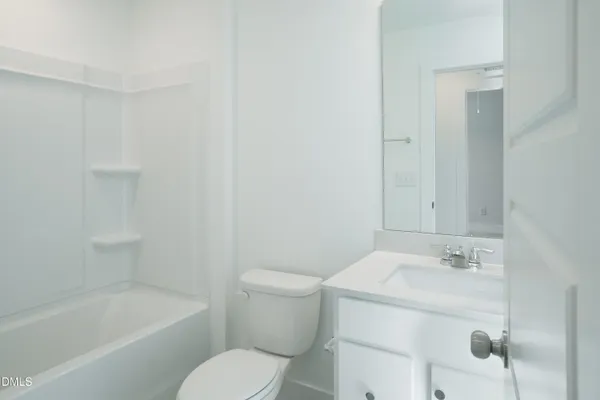 a bathroom with a sink and cabinets