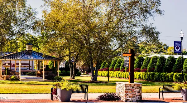 a view of a patio with a yard