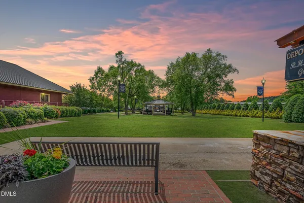 a view of a yard with an outdoor space