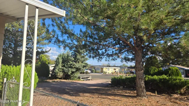 a kitchen with stainless steel appliances a refrigerator sink and cabinets