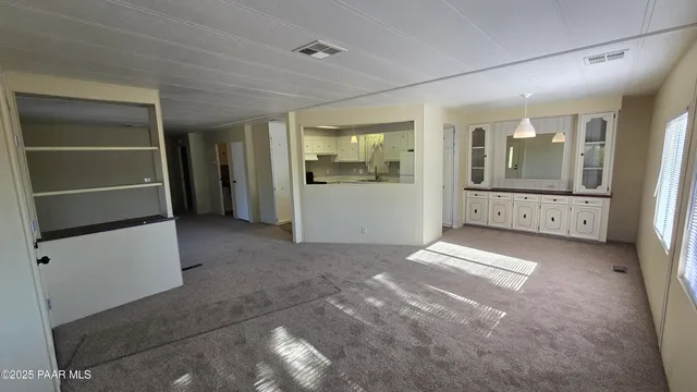 a view of a room that has a window in it