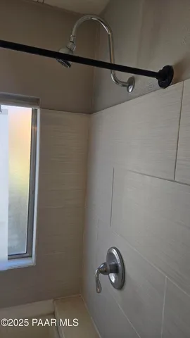 a view of hallway with closet