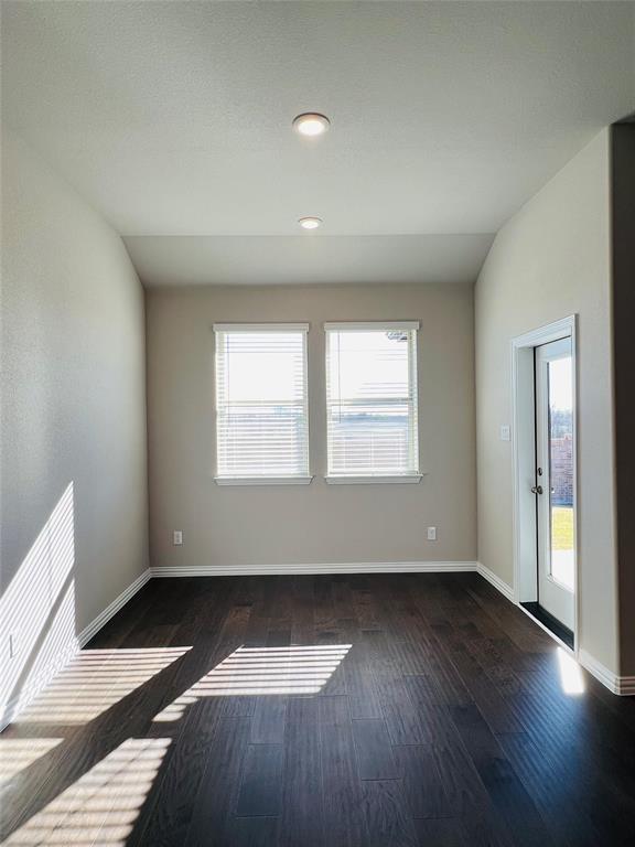 3305 Cross Shr Drive Anna, TX 75409 - Photo 21 of 31 Unfurnished room with dark wood-type flooring and vaulted ceiling