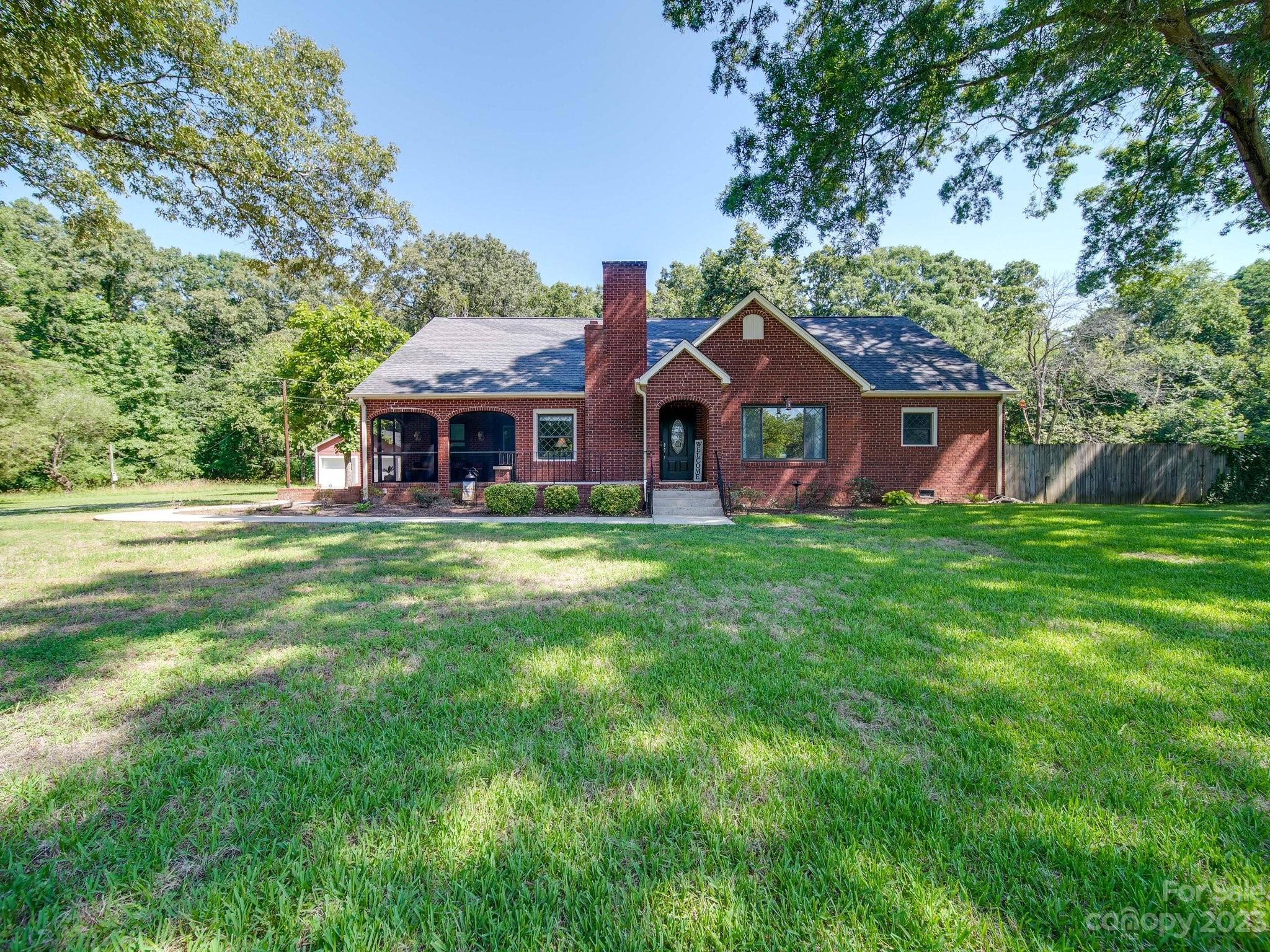 4901 Highway 24 Midland, NC 28107 - Photo 1 of 31 a front view of a house with garden