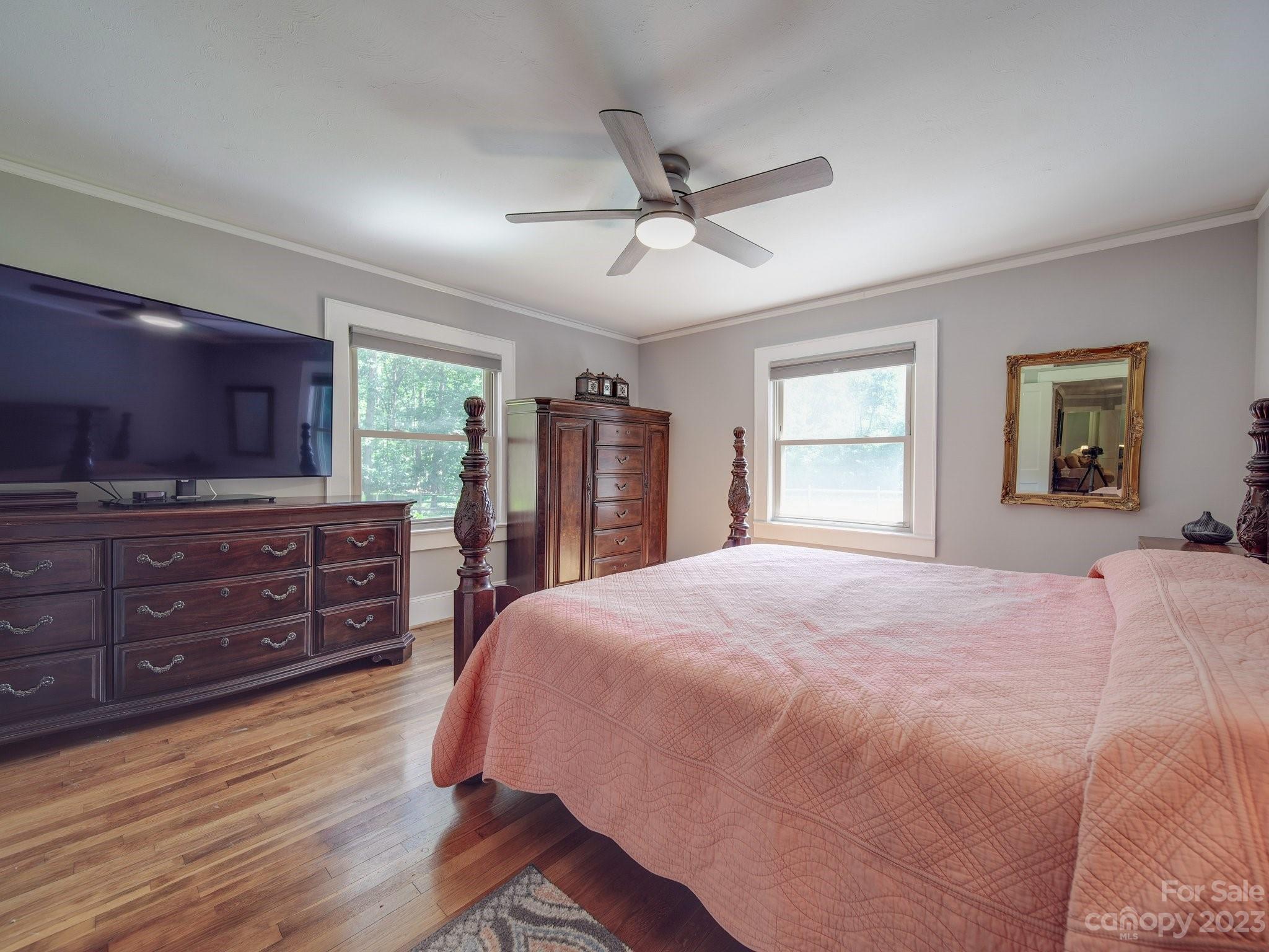 4901 Highway 24 Midland, NC 28107 - Photo 15 of 31 a bedroom with a bed dresser and a window
