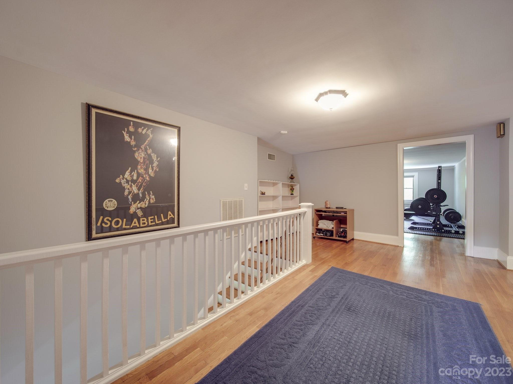 4901 Highway 24 Midland, NC 28107 - Photo 25 of 31 a view of a hallway with wooden floor and furniture
