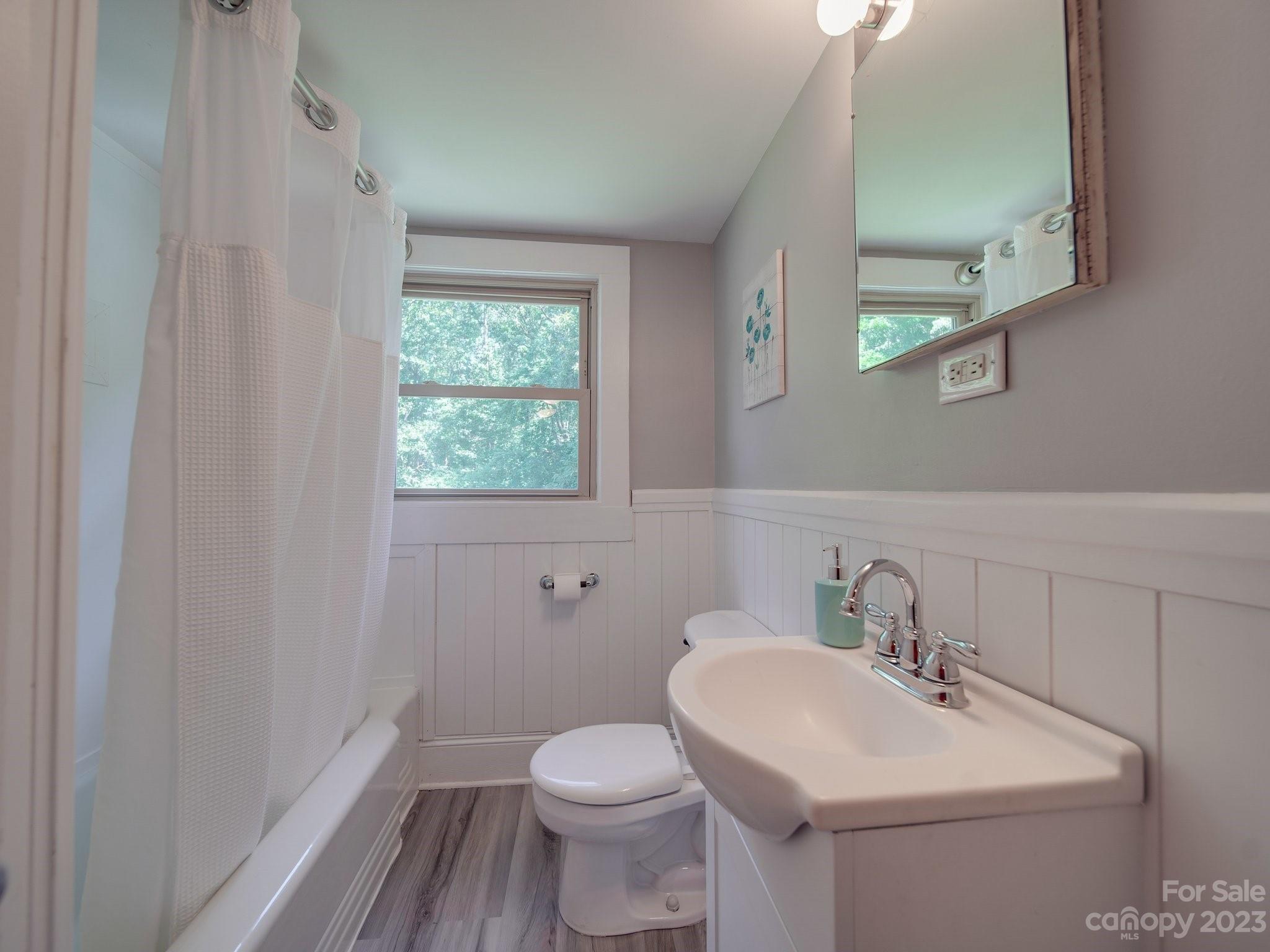 4901 Highway 24 Midland, NC 28107 - Photo 26 of 31 a bathroom with a sink toilet and a mirror