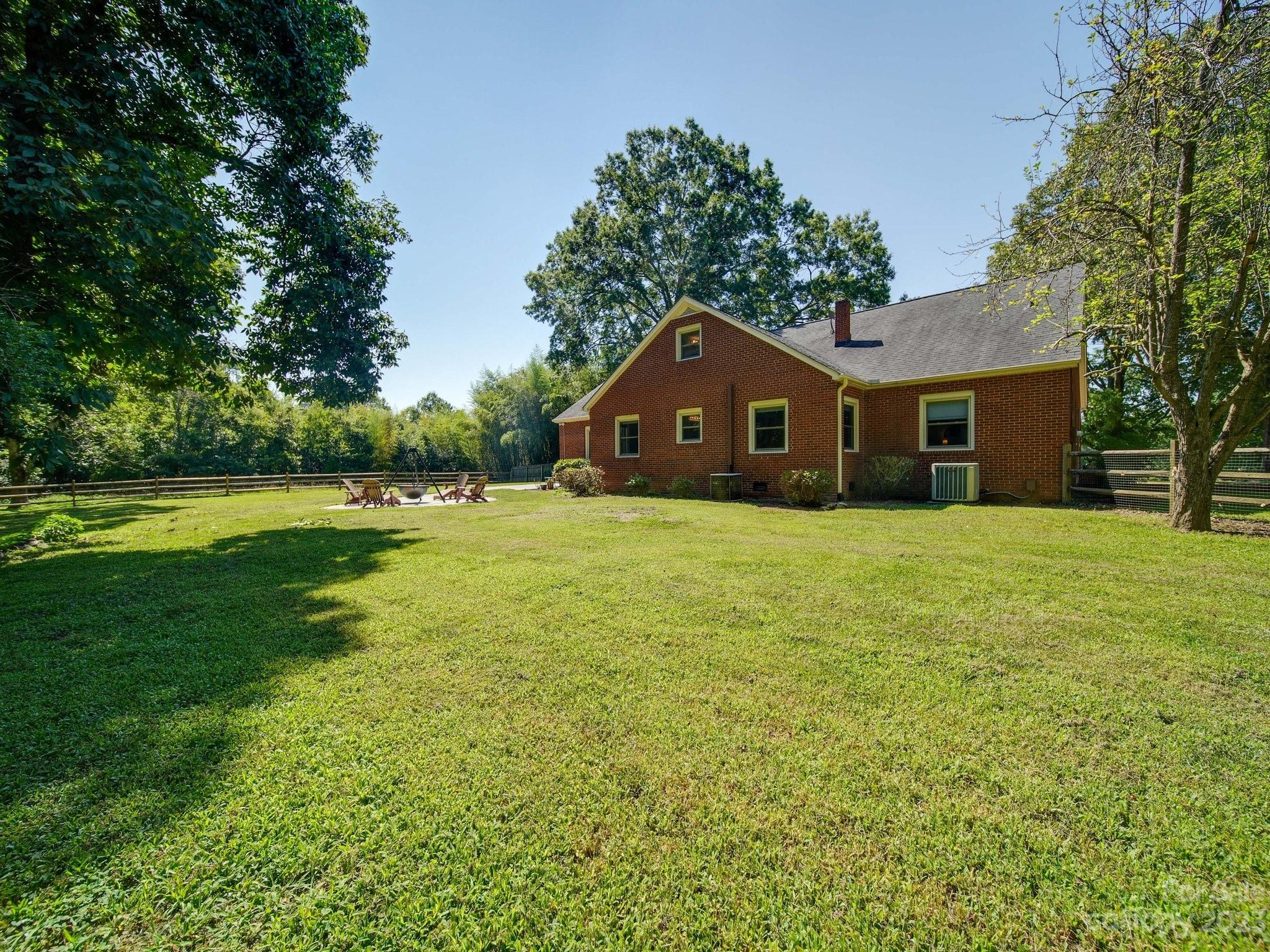 4901 Highway 24 Midland, NC 28107 - Photo 6 of 31 a front view of a house with a yard