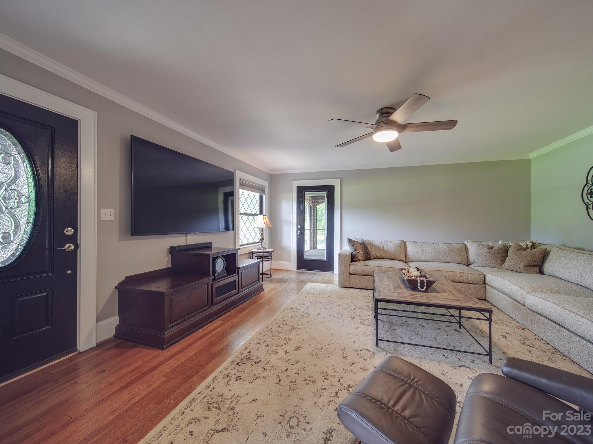 4901 Highway 24 Midland, NC 28107 - Photo 8 of 31 a living room with furniture and a flat screen tv