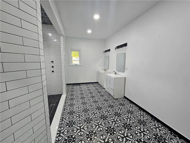 a view of a livingroom with furniture hardwood floor and a window