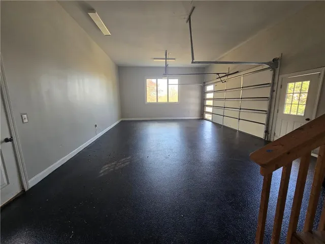 a view of a hallway with an entryway