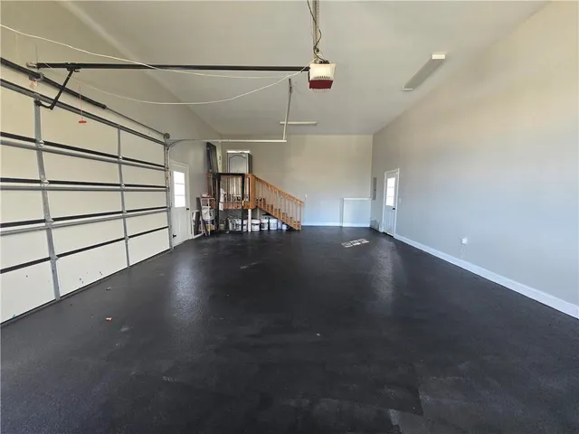 a view of a hallway with staircase
