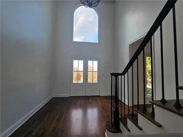 a view of entryway with wooden floor