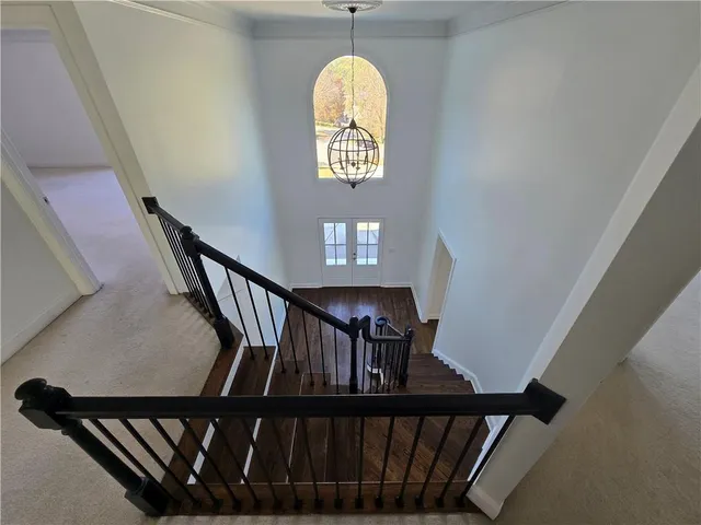 a kitchen with stainless steel appliances a refrigerator and a stove