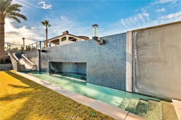 a view of a swimming pool and outdoor space