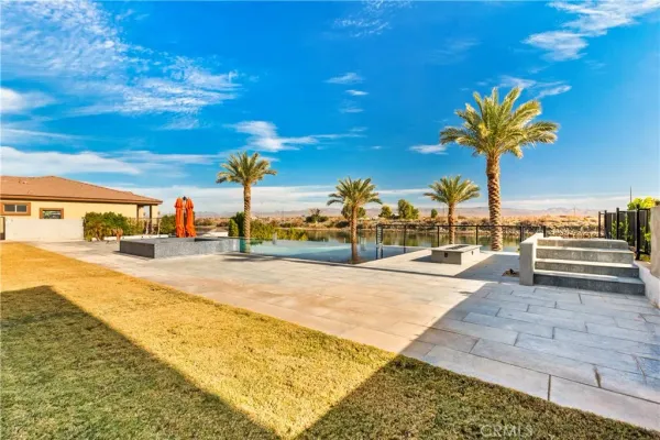 a view of roof deck with palm trees