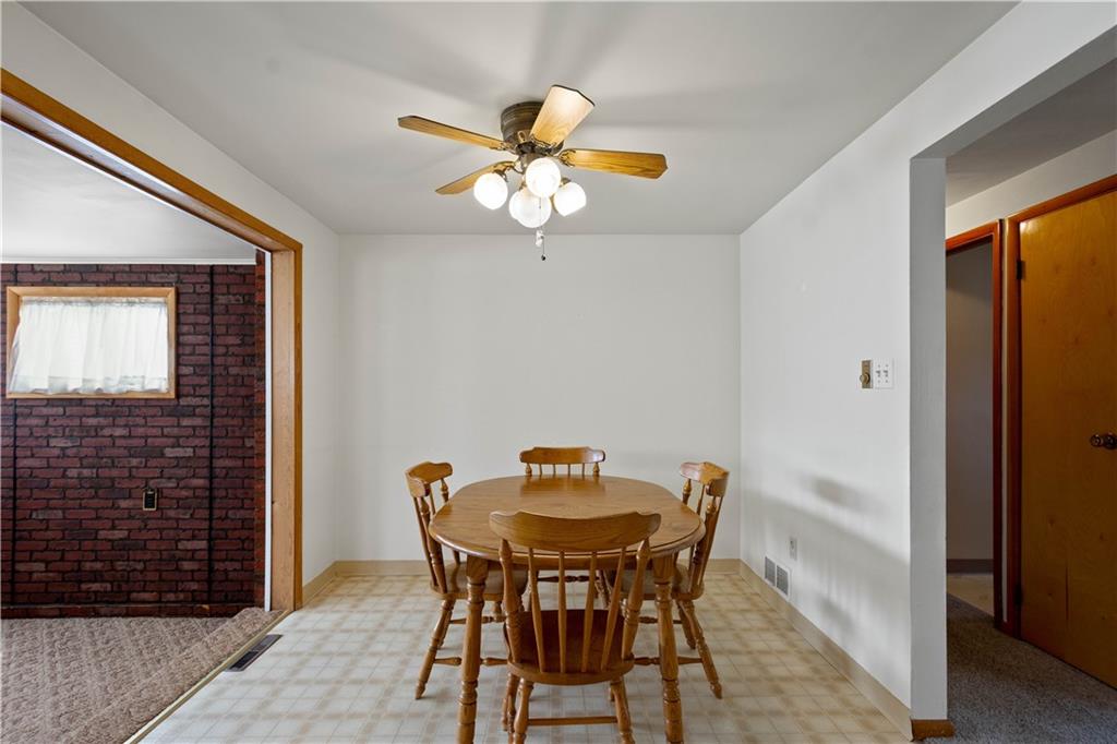 45 Harlem Avenue McKees Rocks, PA 15136 - Photo 11 of 31 a view of a dining room with furniture and a chandelier