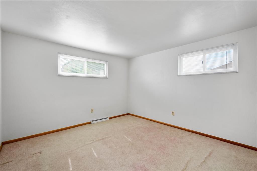 45 Harlem Avenue McKees Rocks, PA 15136 - Photo 16 of 31 an empty room with a workbench