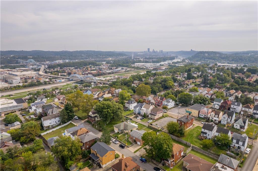 45 Harlem Avenue McKees Rocks, PA 15136 - Photo 29 of 31 an aerial view of residential house with parking and trees