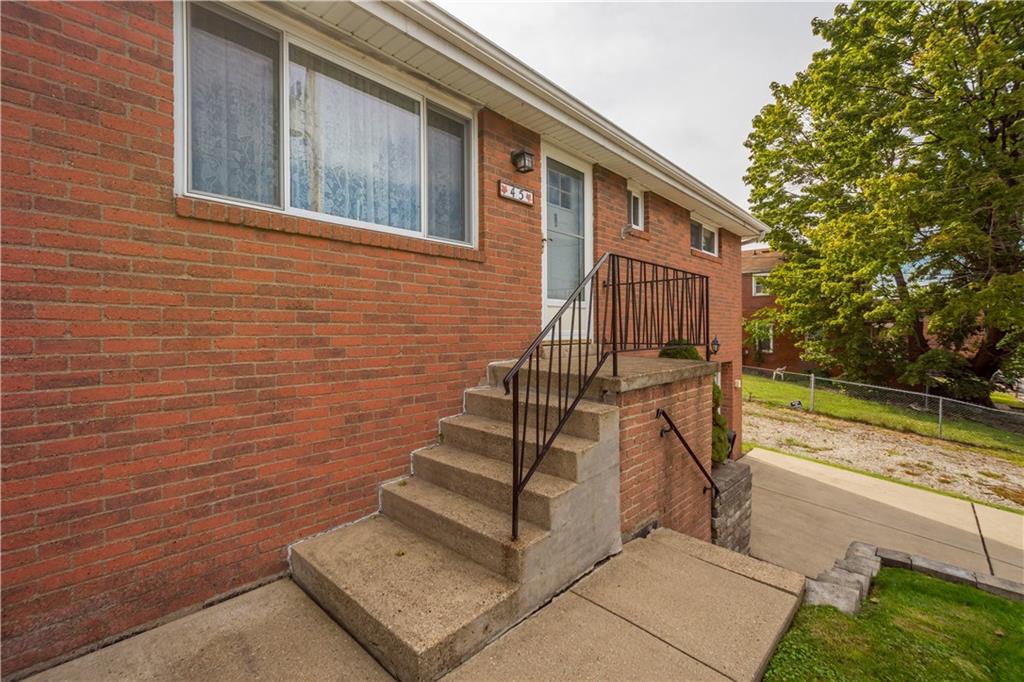 45 Harlem Avenue McKees Rocks, PA 15136 - Photo 4 of 31 a view of house with wooden floor and a large window