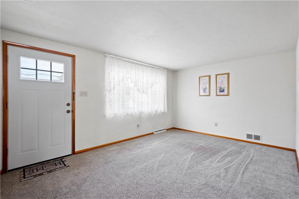 45 Harlem Avenue McKees Rocks, PA 15136 - Photo 6 of 31 an empty room with windows