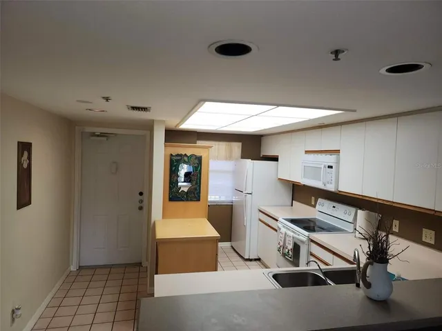 a room with gym equipment and appliances