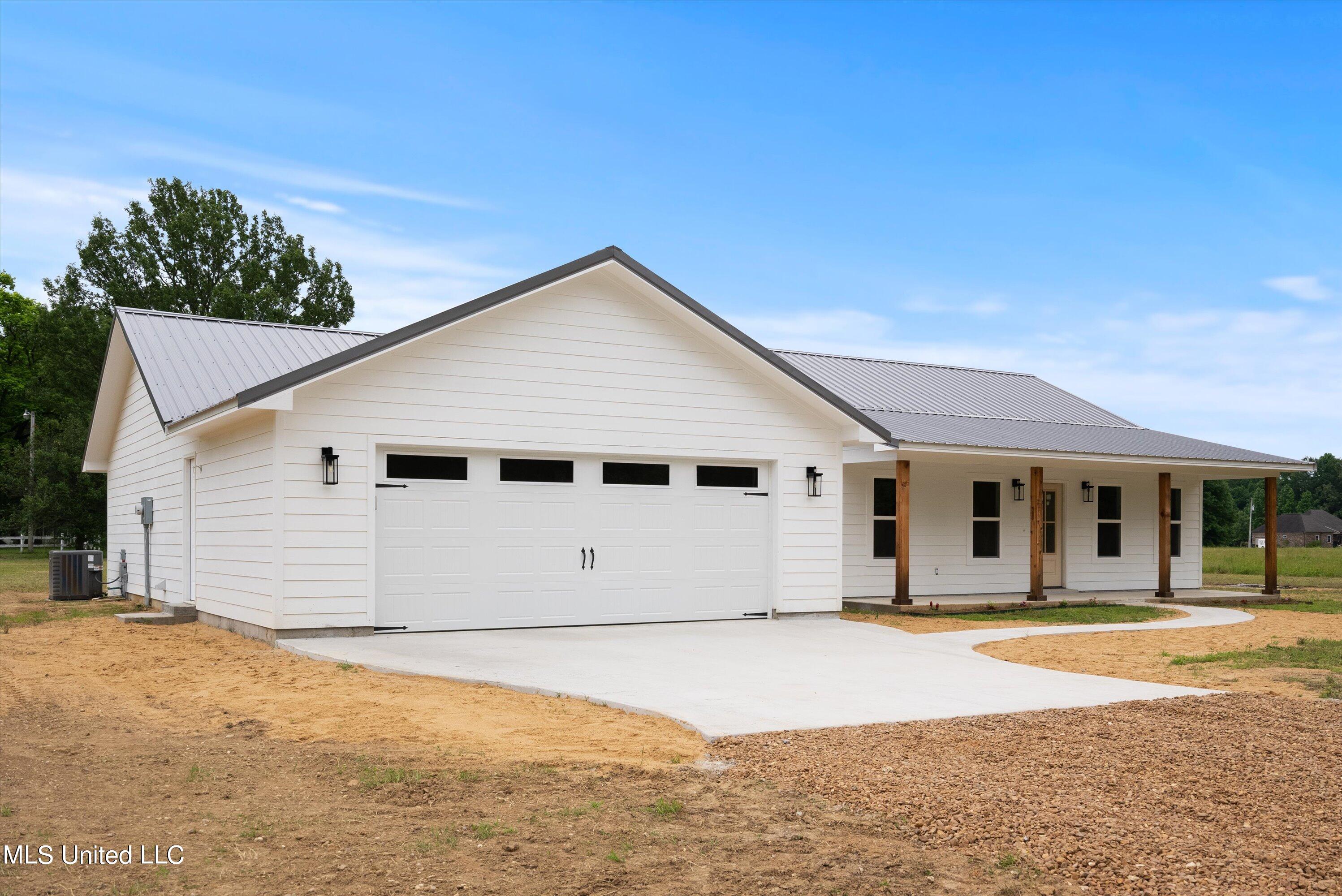357 Parker Road Pope, MS 38658 - Photo 2 of 29 02-Front Exterior