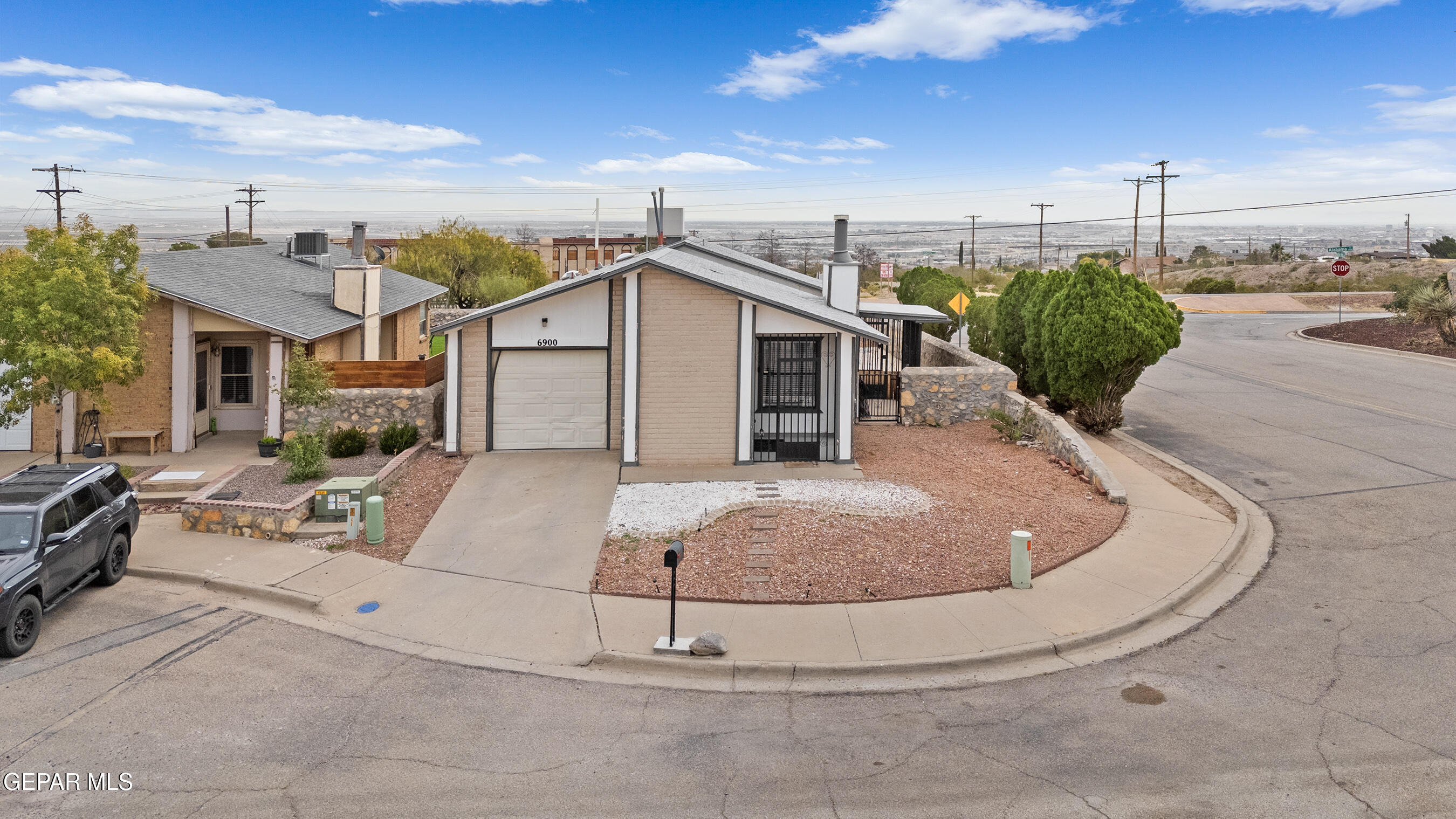 6900 Ridge Top Drive El Paso, TX 79904 - Photo 2 of 32 a view of a house with a patio